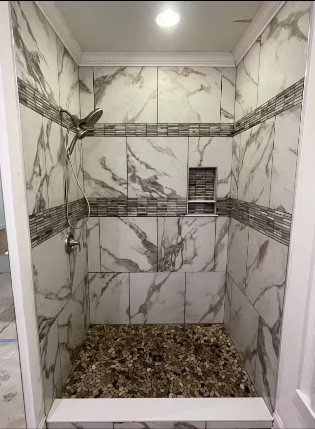 Marble tile walk-in shower renovation
