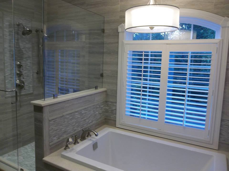 Completed bathroom remodel with updated fixtures and tilework