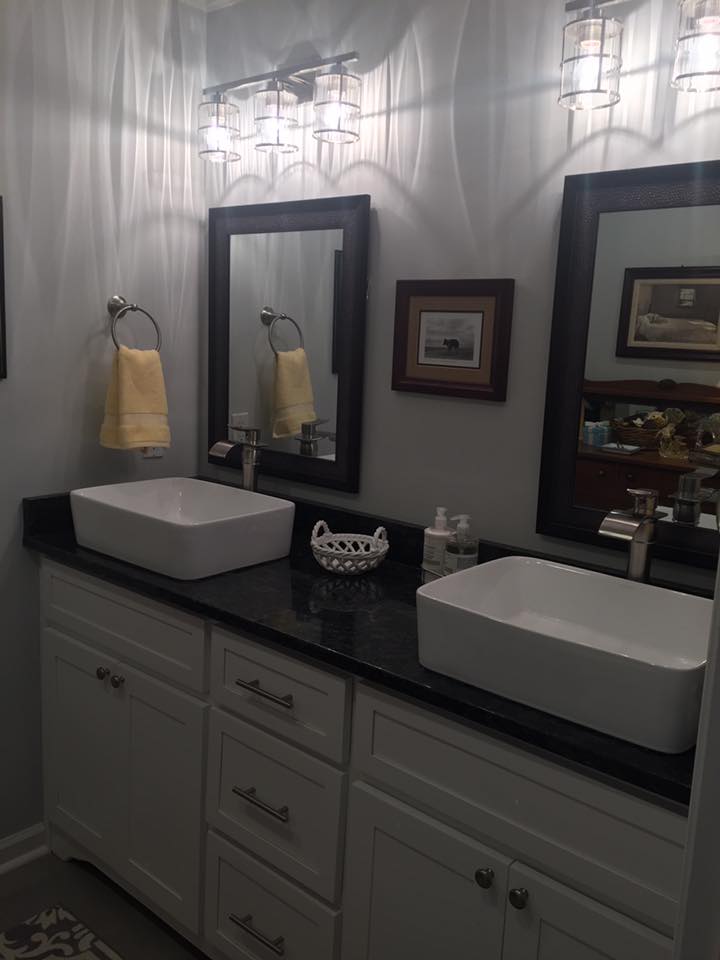 New bathroom vanity installation during full bathroom remodel
