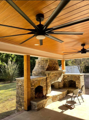 Stone fireplace in renovated living room