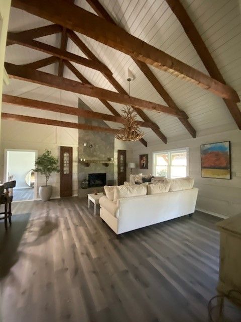Renovated living room with exposed wooden beams