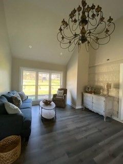 Cabin living area with decorative chandelier