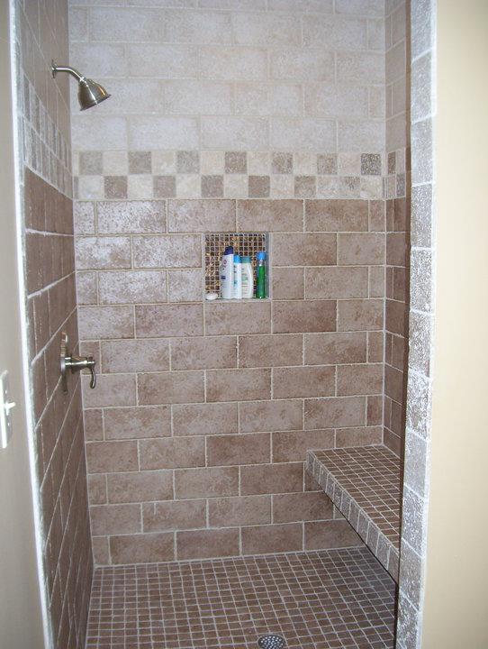 Custom tiled shower with built-in niche